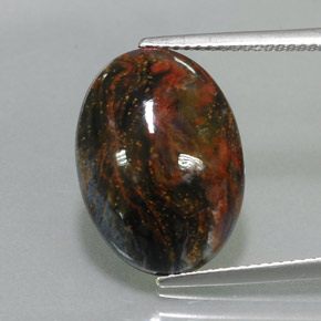 Pietersita multicolorido natural 7,68ct, corte oval, opaco