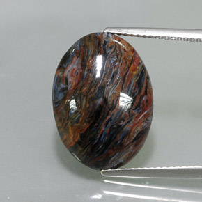 Pietersita multicolorido natural 7,82ct, corte oval, opaco