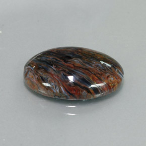 Pietersita multicolorido natural 7,82ct, corte oval, opaco