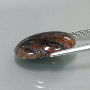 Pietersita multicolorido natural 7,82ct, corte oval, opaco