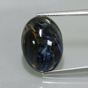 Pietersita multicolorido natural 9,68ct, corte oval, opaco