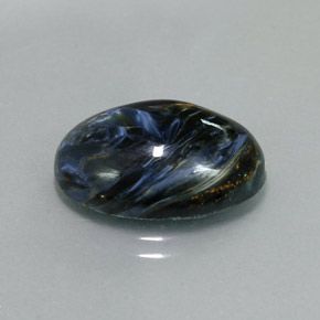 Pietersita multicolorido natural 9,68ct, corte oval, opaco