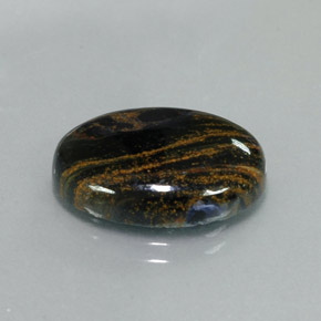 Pietersita multicolorido natural 8,24ct, corte oval, opaco