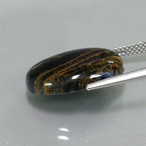 Pietersita multicolorido natural 8,24ct, corte oval, opaco
