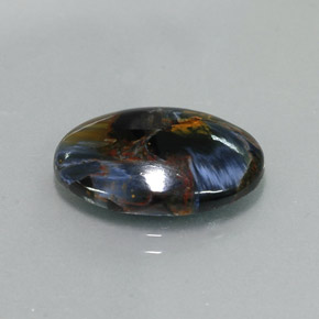 Pietersita multicolorido natural 7,40ct, corte oval, opaco