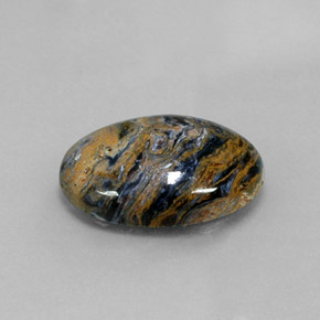 Pietersita multicolorido natural 8,02ct, corte oval, opaco