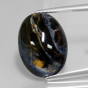 Pietersita multicolorido natural 10,98ct, corte oval, opaco
