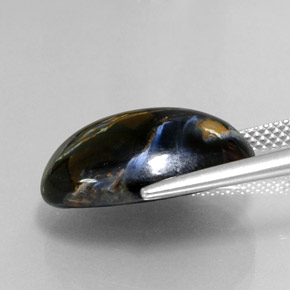 Pietersita multicolorido natural 10,98ct, corte oval, opaco