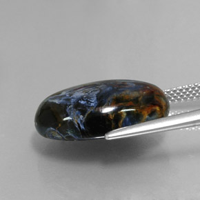 Pietersita multicolorido natural 11,36ct, corte oval, opaco