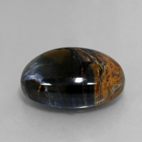 Pietersita multicolorido natural 12,64ct, corte oval, opaco