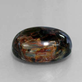 Pietersita multicolorido natural 13,37ct, corte oval, opaco