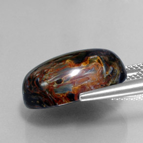 Pietersita multicolorido natural 13,37ct, corte oval, opaco