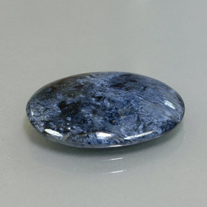 Pietersita multicolorido natural 5,59ct, corte oval, opaco