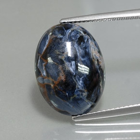 Pietersita multicolorido natural 9,37ct, corte oval, opaco