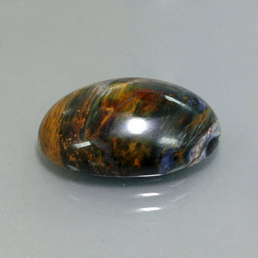 Pietersita multicolorido natural 9,76ct, corte oval, opaco