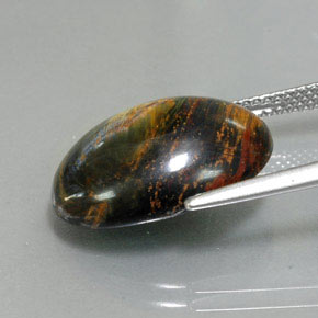Pietersita multicolorido natural 9,76ct, corte oval, opaco