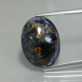 Pietersita multicolorido natural 9,96ct, corte oval, opaco