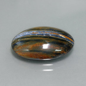 Pietersita multicolorido natural 7,66ct, corte oval, opaco