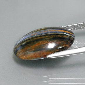 Pietersita multicolorido natural 7,66ct, corte oval, opaco