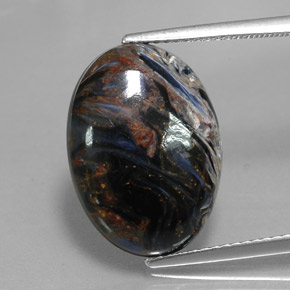 Pietersita multicolorido natural 7,94ct, corte oval, opaco