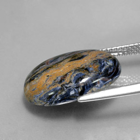 Pietersita multicolorido natural 8,32ct, corte oval, opaco
