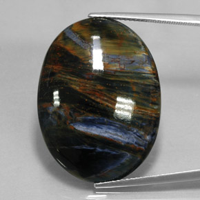 Pietersita multicolorido natural 27,17ct, corte oval, opaco