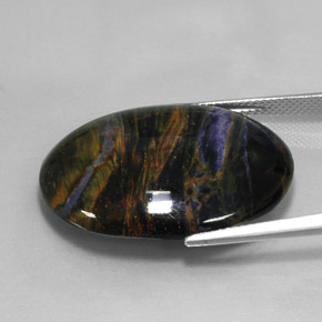 Pietersita multicolorido natural 27,17ct, corte oval, opaco