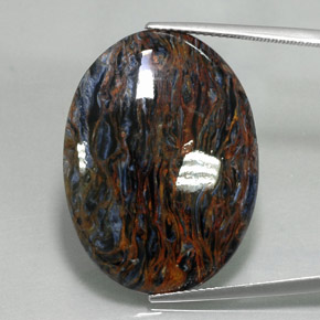 Pietersita multicolorido natural 21,37ct, corte oval, opaco