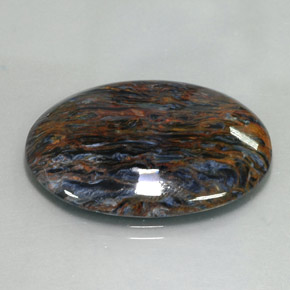 Pietersita multicolorido natural 21,37ct, corte oval, opaco