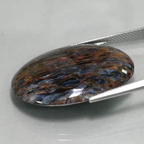 Pietersita multicolorido natural 21,37ct, corte oval, opaco