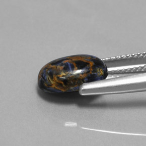 Pietersita multicolorido natural 3,23ct, corte oval, opaco