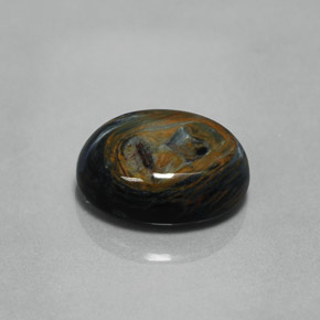 Pietersita multicolorido natural 4,34ct, corte oval, opaco
