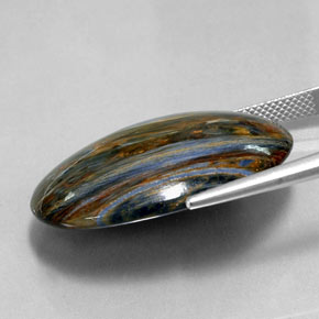Pietersita multicolorido natural 30,29ct, corte oval, opaco