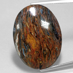 Pietersita multicolorido natural 22,70ct, corte oval, opaco