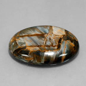 Pietersita azul natural 30,34ct, corte oval, opaco