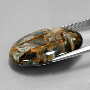 Pietersita azul natural 30,34ct, corte oval, opaco