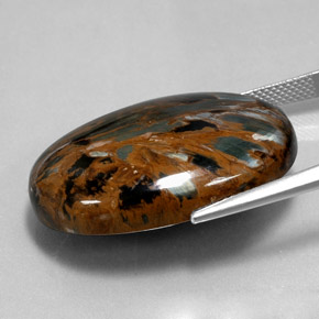 Pietersita multicolorido natural 38,54ct, corte oval, opaco