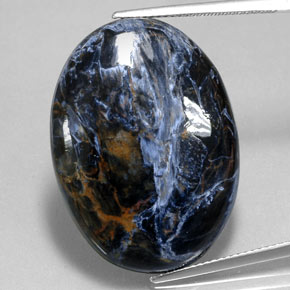 Pietersita multicolorido natural 27,74ct, corte oval, opaco