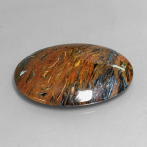 Pietersita multicolorido natural 25,47ct, corte oval, opaco