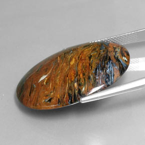 Pietersita multicolorido natural 25,47ct, corte oval, opaco