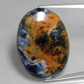 Pietersita multicolorido natural 26,63ct, corte oval, opaco