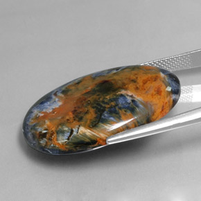 Pietersita multicolorido natural 26,63ct, corte oval, opaco