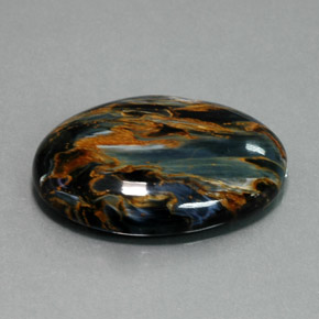 Pietersita azul natural 32,61ct, corte oval, opaco