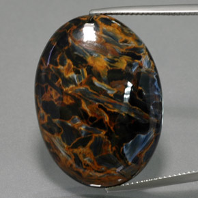 Pietersita azul natural 36,58ct, corte oval, opaco