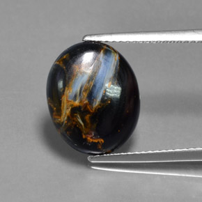 Pietersita multicolorido natural 5,19ct, corte oval, opaco