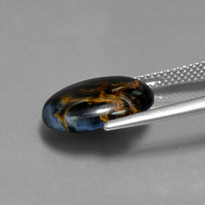 Pietersita multicolorido natural 5,19ct, corte oval, opaco