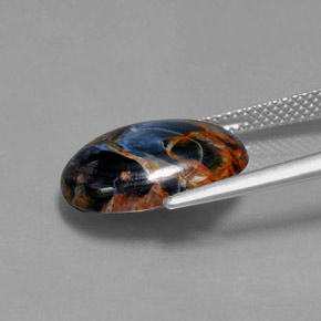 Pietersita multicolorido natural 5,42ct, corte oval, opaco