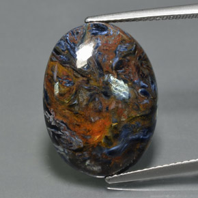 Pietersita multicolorido natural 10,12ct, corte oval, opaco