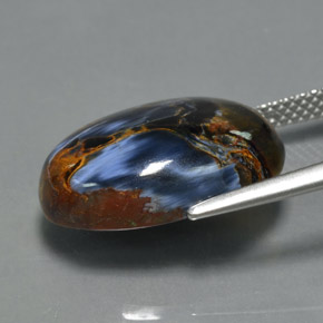 Pietersita multicolorido natural 10,35ct, corte oval, opaco