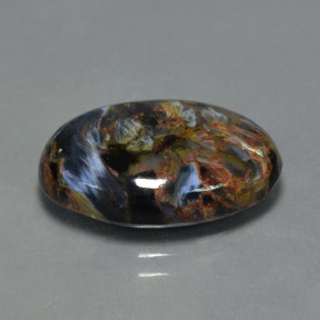 Pietersita multicolorido natural 8,29ct, corte oval, opaco